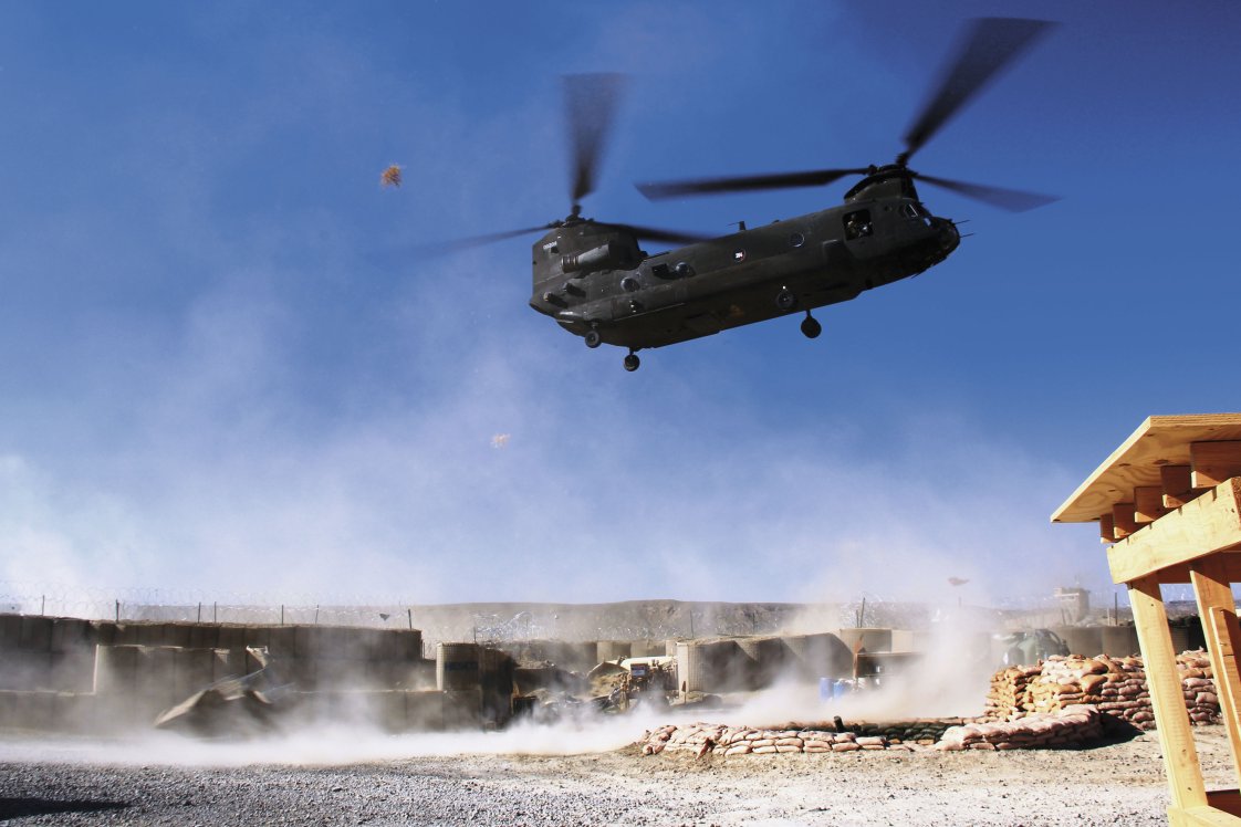 A US Army Chinook helicopter landing at an outpost in eastern Afghanistan. The service plans to award the first LRIP contract for the Block 2 upgrade soon. (IHS Markit/Gareth Jennings)