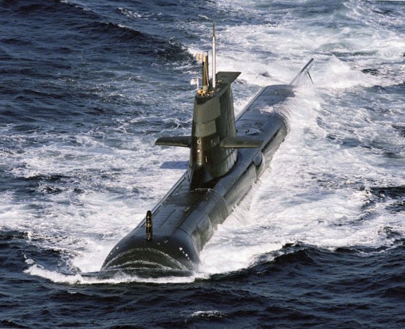 
        Collins-class submarine HMAS
        Sheean
        at sea off western Australia. The Collins class could now end up staying in service into the 2030s.
       (ABPH Joanne Edwards/Australian DoD)