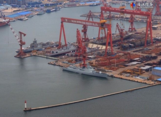 The two most recently launched Type 052Ds are seen here in the dry dock closest to the water a few days prior to launch at Dalian. Also visible, but afloat, are a Type 055 and 052D destroyer launched a few months ago, while at the rear of the dry dock are a Type 055 and 052D that are currently under construction. (Via haohanfw)