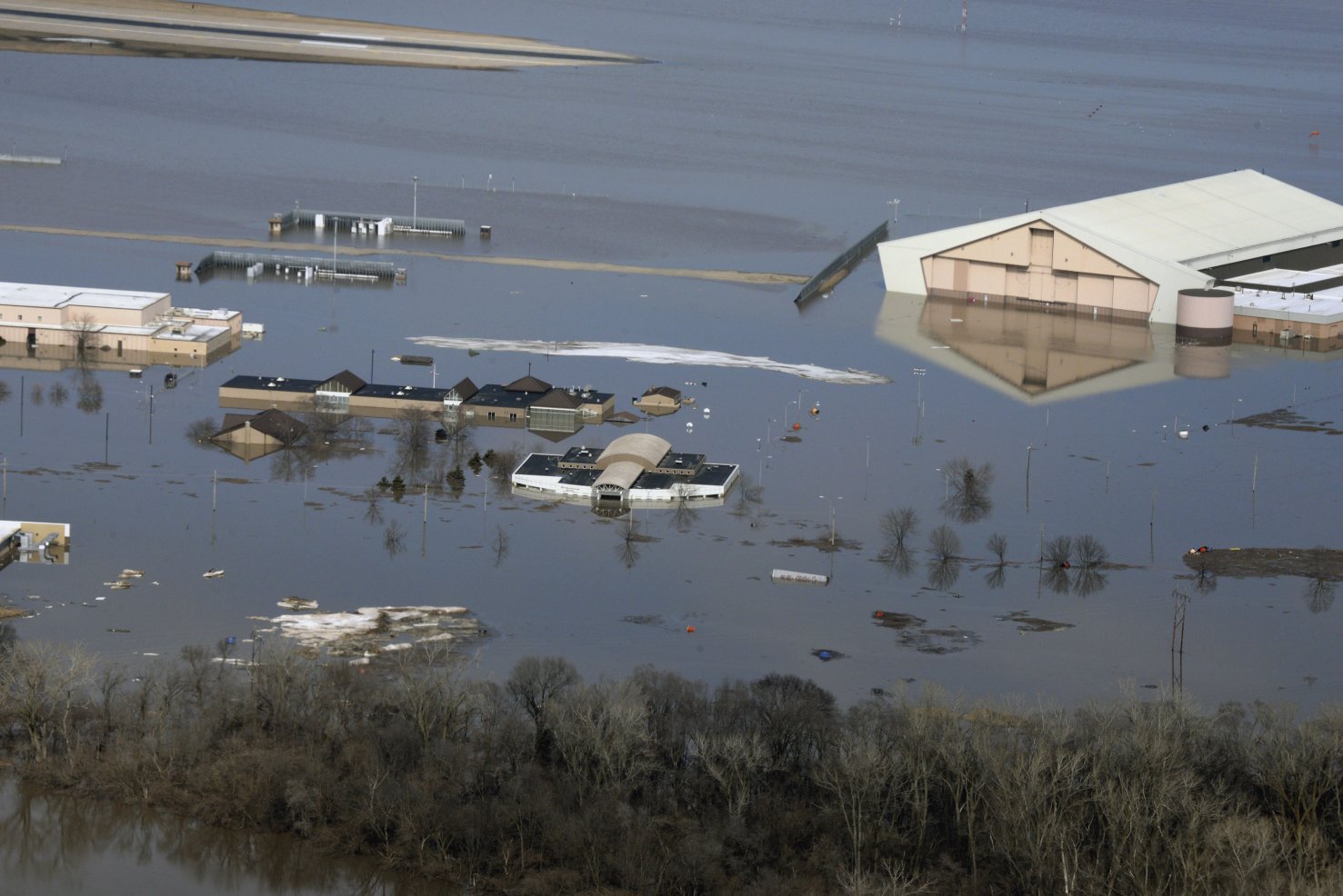 Flooding in the Midwestern US during March damaged many buildings on the southern half of Offutt Air Force Base, Nebraska. (US Air Force)