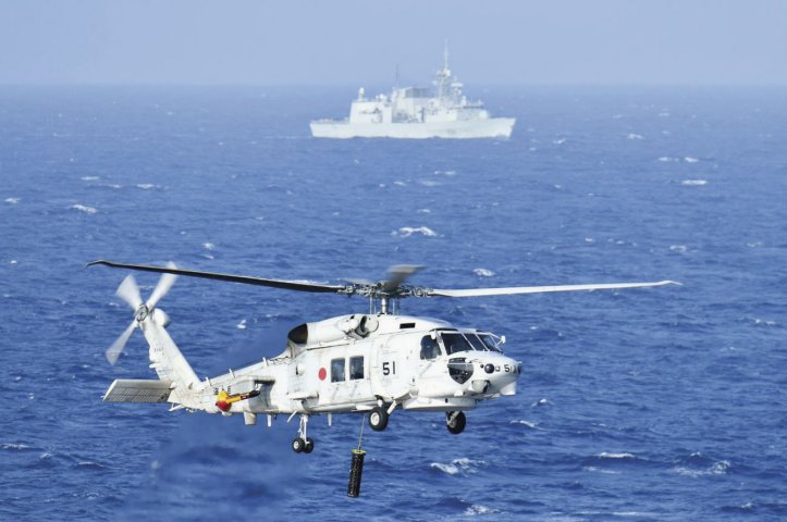 The JMSDF conducting interoperability  exercises with the RCN in the South China Sea in June. (JMSDF)