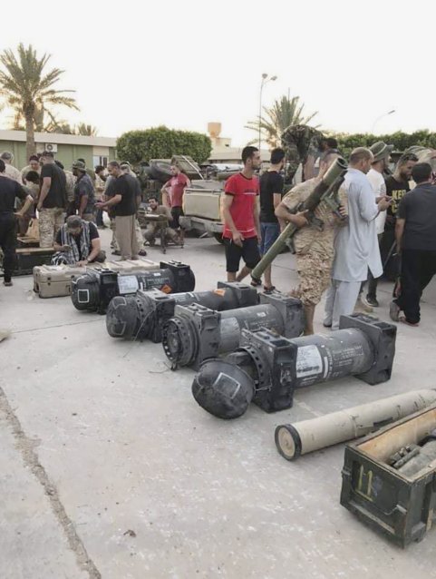 GNA fighters inspect weapons, including containers for Javelin anti-tank missiles, purportedly recovered during the capture of Gharyan. (Operation Burkan al-Ghadab)