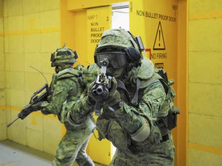 SAF troops breaching a building during an urban operations training exercise. Singapore has announced new measures to boost military response to terror attacks. (IHS Markit/Kelvin Wong)