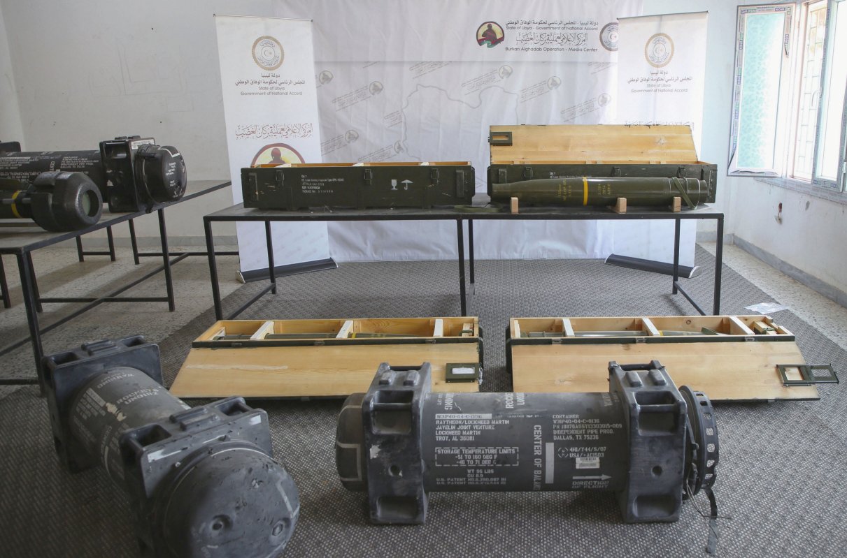 Four Norinco GP6 155 mm laser-guided artillery projectiles, three containers for Javelin missiles, and a Javelin launch tube are seen displayed in Tripoli on 29 June by Operation Burkan al-Ghadab, the co-ordinating body for GNA-aligned forces. (AFP/Getty Images)