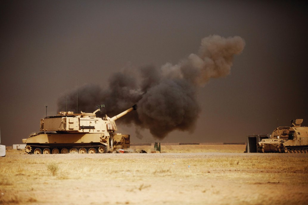 A US Army M109A6 Paladin howitzer conducts a fire mission at Qayyarah West Airfield in Iraq as coalition forces move towards Mosul. The army's ERCA effort is designed to increase the M109A7's range and rate of fire. (US Army)