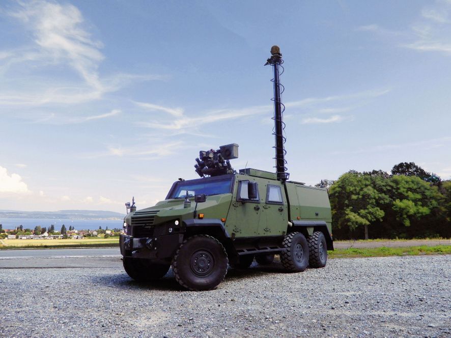 An Eagle 6×6 developed to meet Swiss army requirements, showing a protected four-door compartment, mast-mounted sensor pack, and Kongsberg remote weapon station. (GDELS-MOWAG)