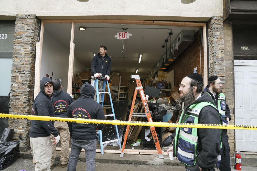 Aftermath of a small-arms attack on a kosher supermarket in New Jersey, the United States, on 10 December 2019. (Bryan R Smith/AFP via Getty Images )