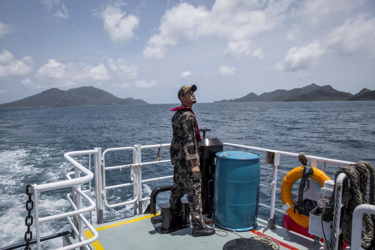 An Indonesian Ministry of Maritime Affairs and Fisheries official prepares to conduct security patrols in the Natuna Islands region (Ulet Ifansasti/Getty Images)