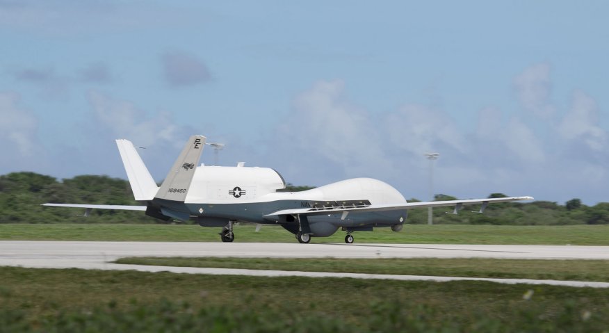 An MQ-4C Triton unmanned aircraft system (UAS) taxis after landing at Andersen Air Force Base for a deployment as part of an early operational capability (EOC) to further develop the concept of operations and fleet learning associated with operating a high-altitude, long-endurance system in the maritime domain. (US Air Force)