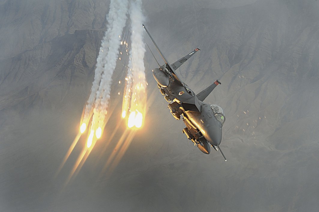 A US Air Force F-15E Strike Eagle dispenses flares during the supposed-height of the Afghan conflict in 2010. Since that time, the number of airstrikes conducted by US aircraft has markedly increased, with 2019 posting record figures. The first month of 2020 continues this trend. (US Air Force)