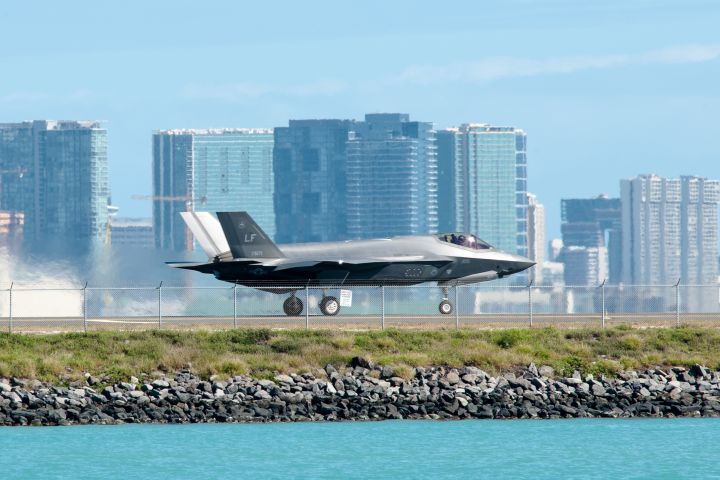 A F-35A, assigned to Luke Air Force Base, Arizona, taxis down the Honolulu Airport runway on 29 January. Newer model F-35As have developed cracking in the outer mold-line coatings and the underlying chine longeron skin after gun use. (US Air Force)