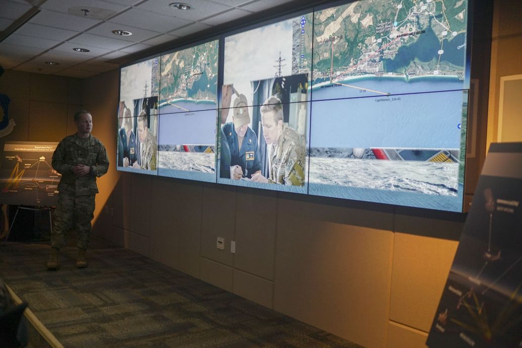 Lieutenant Colonel Matthew Strohmeyer, NORTHCOM scenario co-ordinator, delivers a capabilities brief to senior leadership during the first-ever Advanced Battle Management System (ABMS) demonstration on 18 December 2019 at Eglin Air Force Base, Florida. The USAF is delaying its second ABMS demo from April to June. (US Air Force)