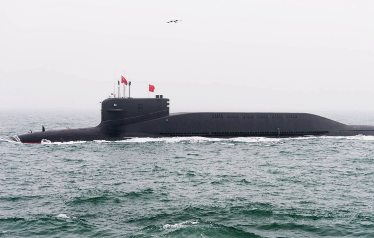 
        One of the PLAN’s Type 094 SSBNs during a fleet review in April 2019.
        Global Times
        reported on 22 April that the service recently commissioned a “new strategic nuclear-powered submarine”. No details were provided by the paper but it is possible that it is referring to a further improved Type 094.
       (TASS)